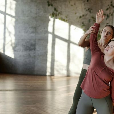 Detail of a yoga mat in a sunlit room.