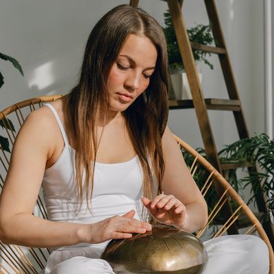 Minimalist interior of a practice space with plants.